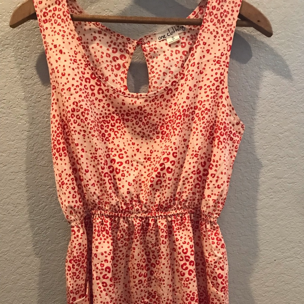 Size small sleeveless just above knee length dress. Keyhole back. Light material